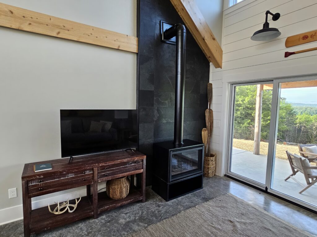 Modern living room with fireplace and outdoor view