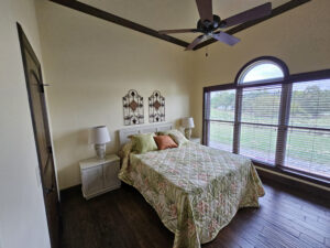 Guest Bedroom with Arched Windows